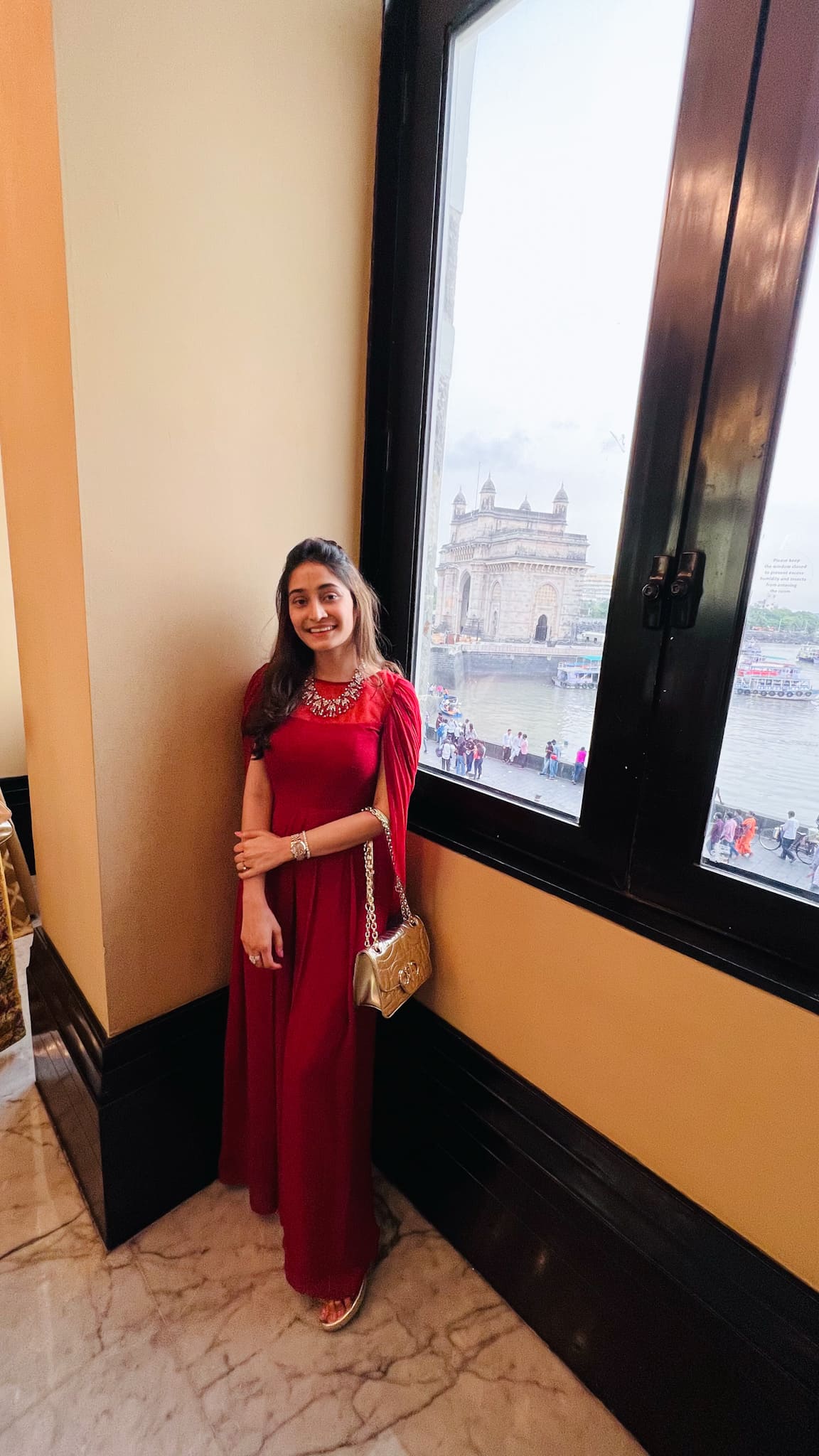 RED JUMPSUIT WITH BACK DRAPE